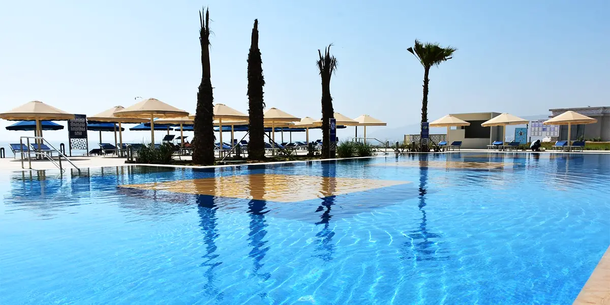 https://toduk.blob.core.windows.net/hotelimage/package/slider/white-beach-resort-taghazout-pool.webp